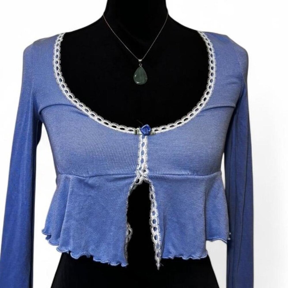 Blue lace trim long sleeve top with button up front and ruffle hem